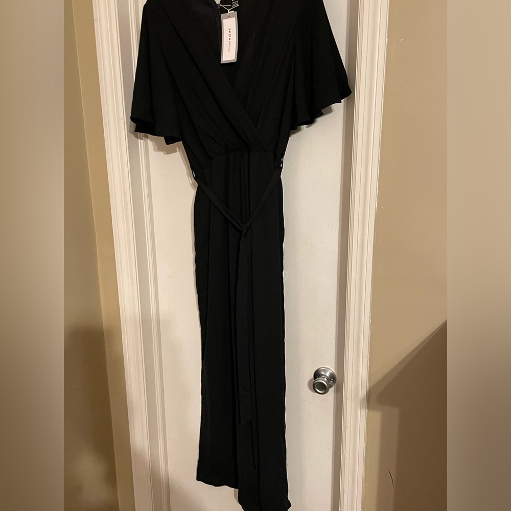 SHEIN large black jumpsuit. Loose, flowing sleeves. Never worn with tags.